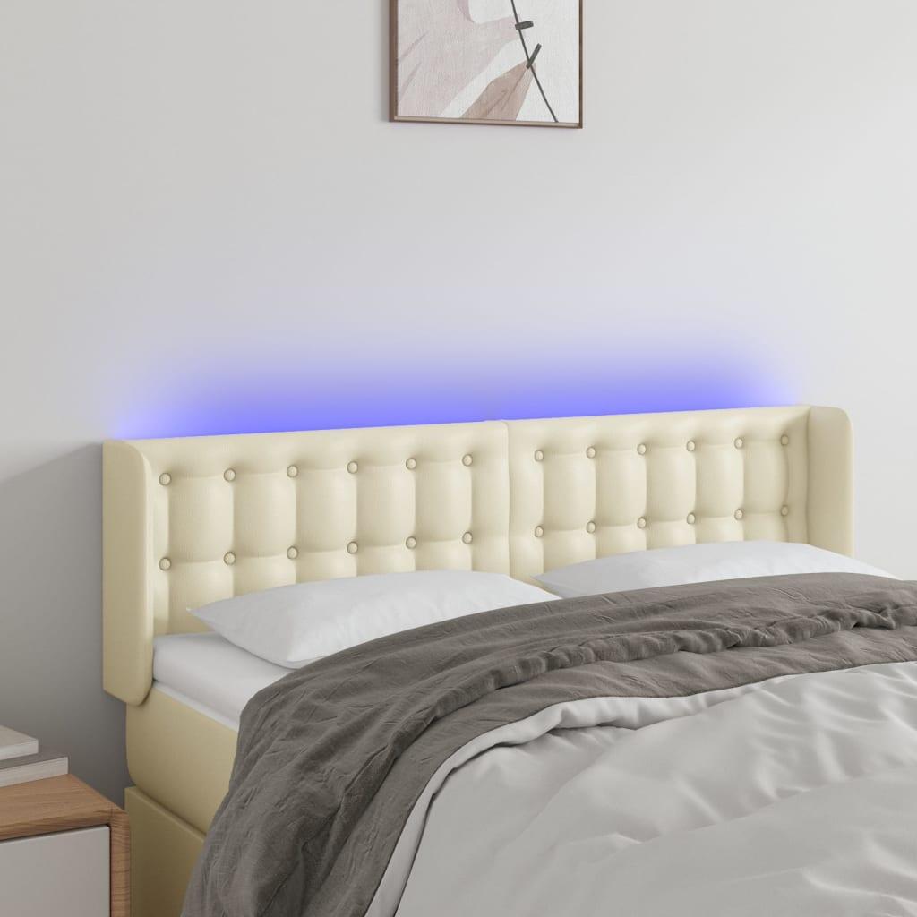 Sengegavl med LED-lys 147x16x78/88 cm kunstlæder cremefarvet billede