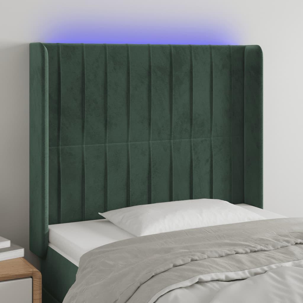 Sengegavl med LED-lys 103x16x118/128 cm fløjl mørkegrøn billede