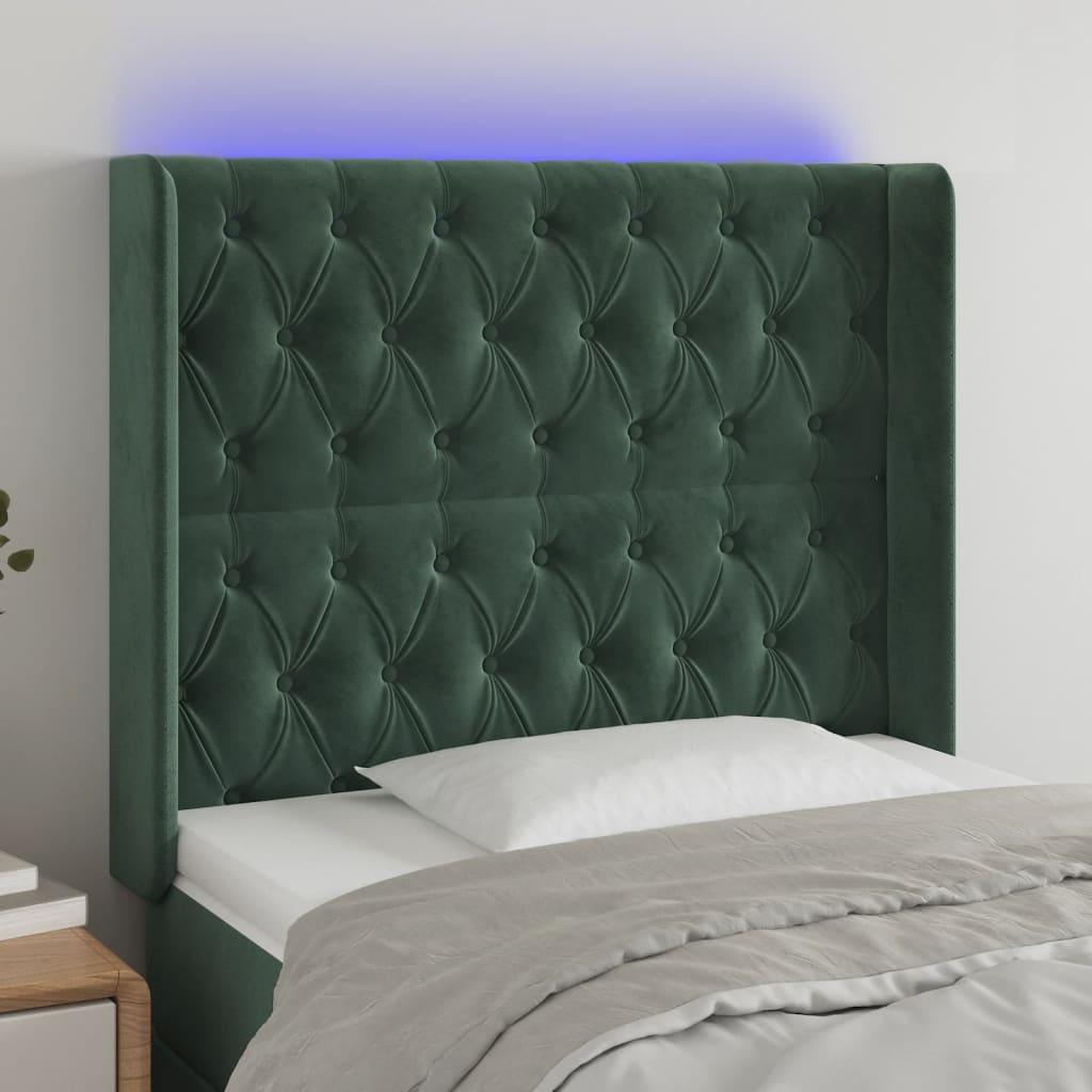 Sengegavl med LED-lys 103x16x118/128 cm fløjl mørkegrøn billede