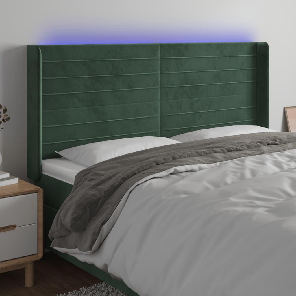 Sengegavl med LED-lys 183x16x118/128 cm fløjl mørkegrøn billede