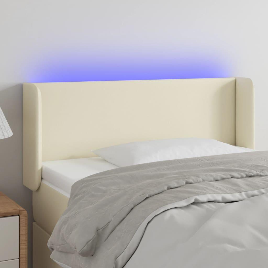 Sengegavl med LED-lys 103x16x78/88 cm kunstlæder cremefarvet billede