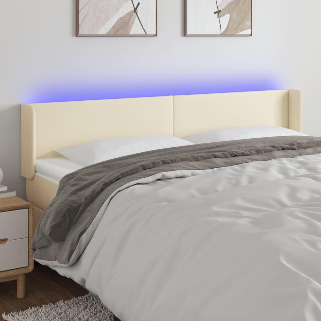 Sengegavl med LED-lys 163x16x78/88 cm kunstlæder cremefarvet billede