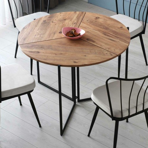 Spisebord rundt med tredelt bordplade og sort stel