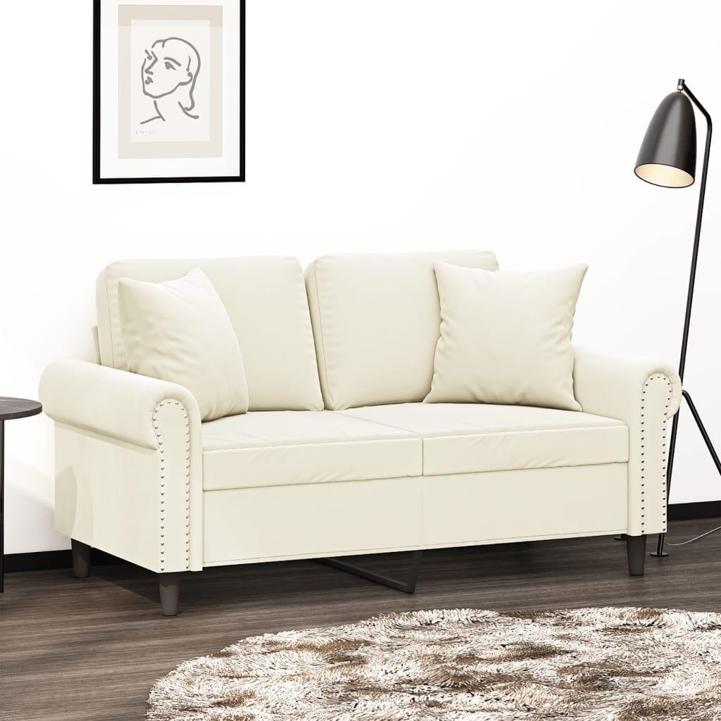 2-personers sofa med pyntepuder 120 cm velour cremefarvet billede