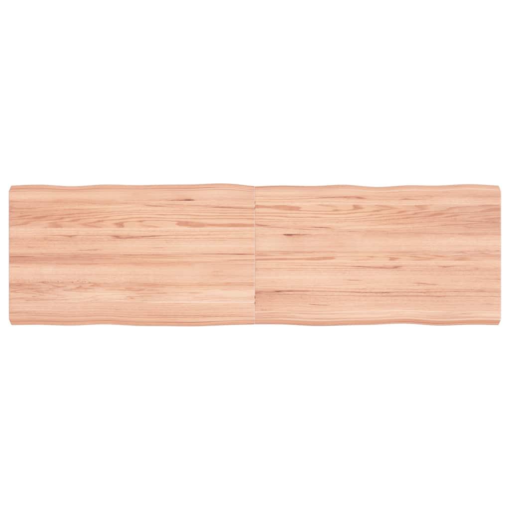 Bordplade 140x40x(2-4) cm naturlig kant behandlet træ lysebrun billede
