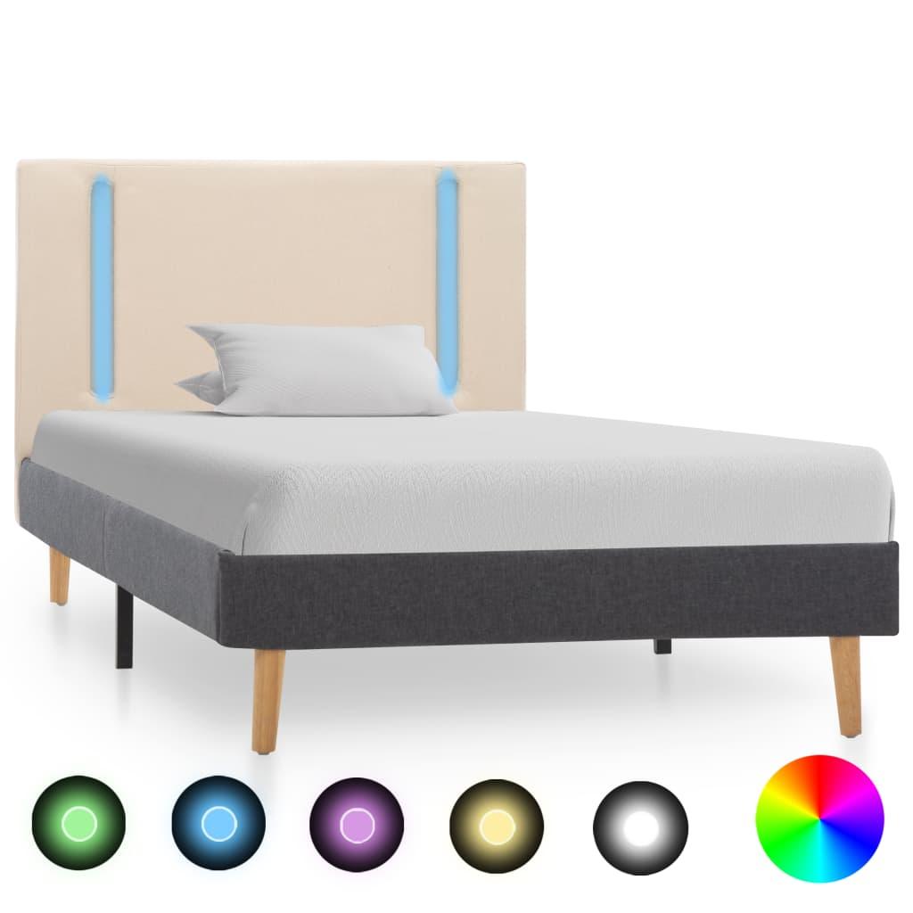 Sengestel med LED-lys 100x200 cm i stof - cremefarvet og mørkegrå billede