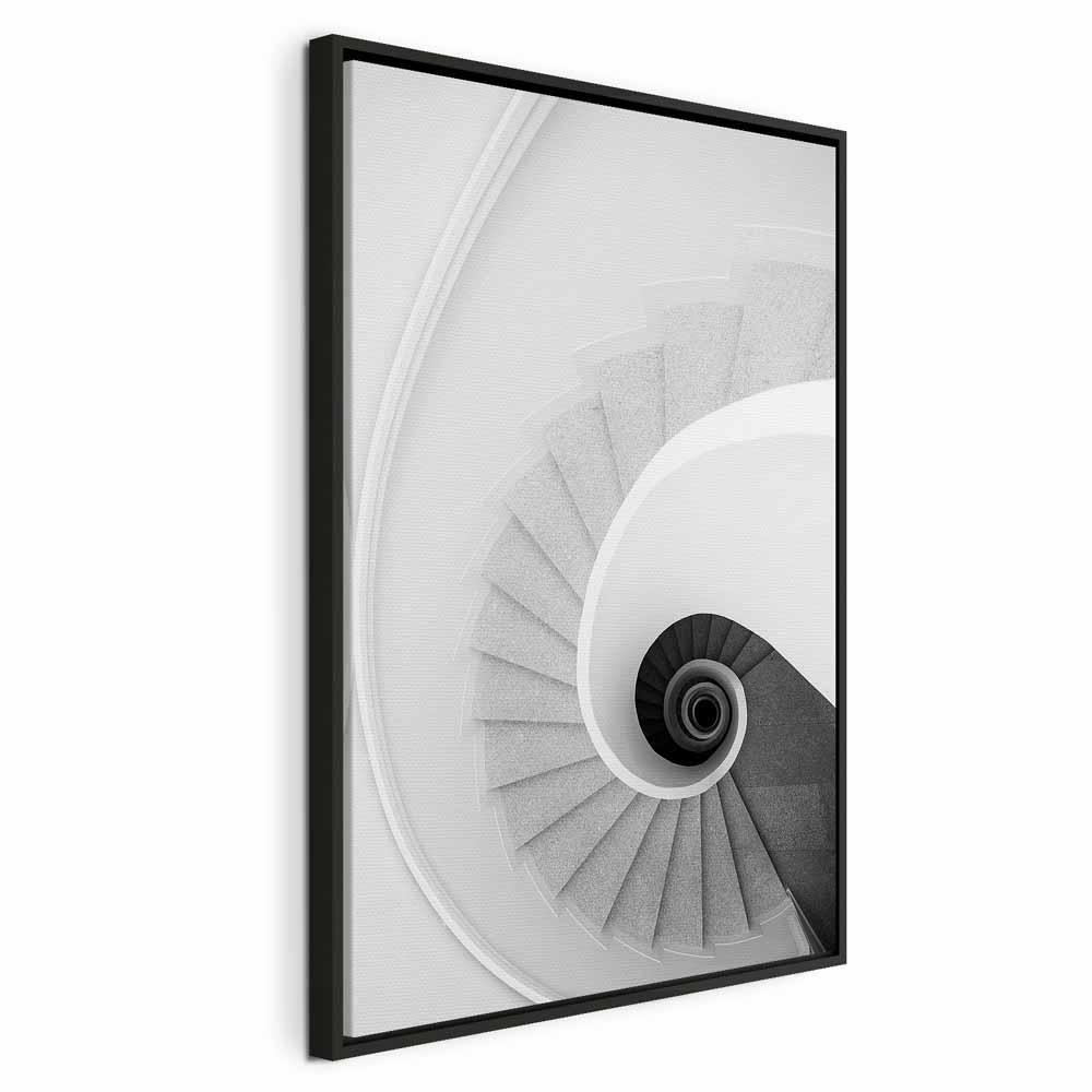 Lærredsbillede White Stairs - vertikalt vægbillede med spiraltrappe motiv, 1 del - 40 x 60 cm - I en sort træramme