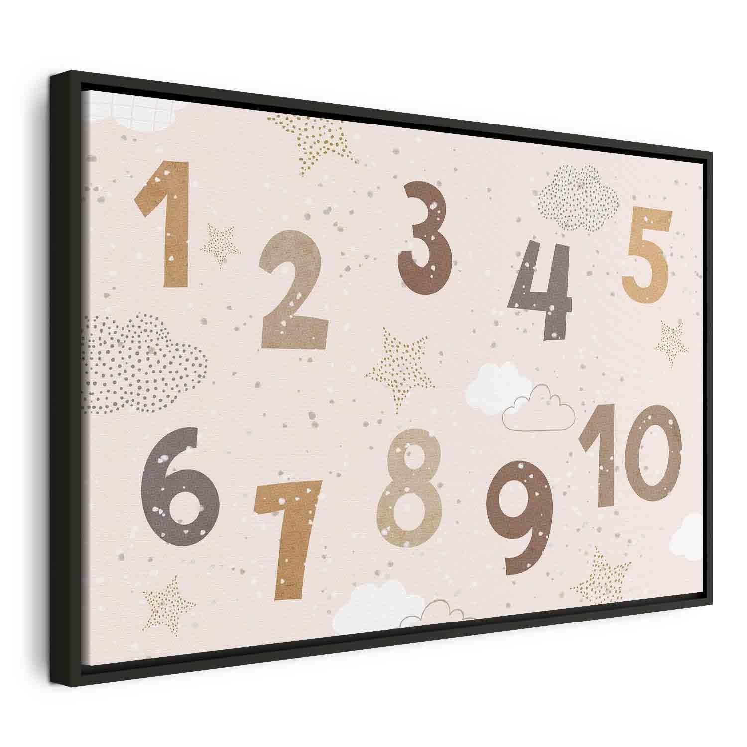 Billede på lærred - Springende tal i dæmpede beige-brune nuancer med stjerner, skyer og snefnug - 60 x 40 cm - I en sort træramme