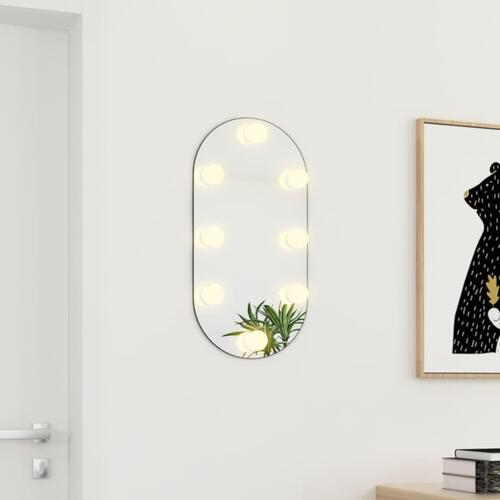 Spejl med LED-lamper 60x30 cm oval glas