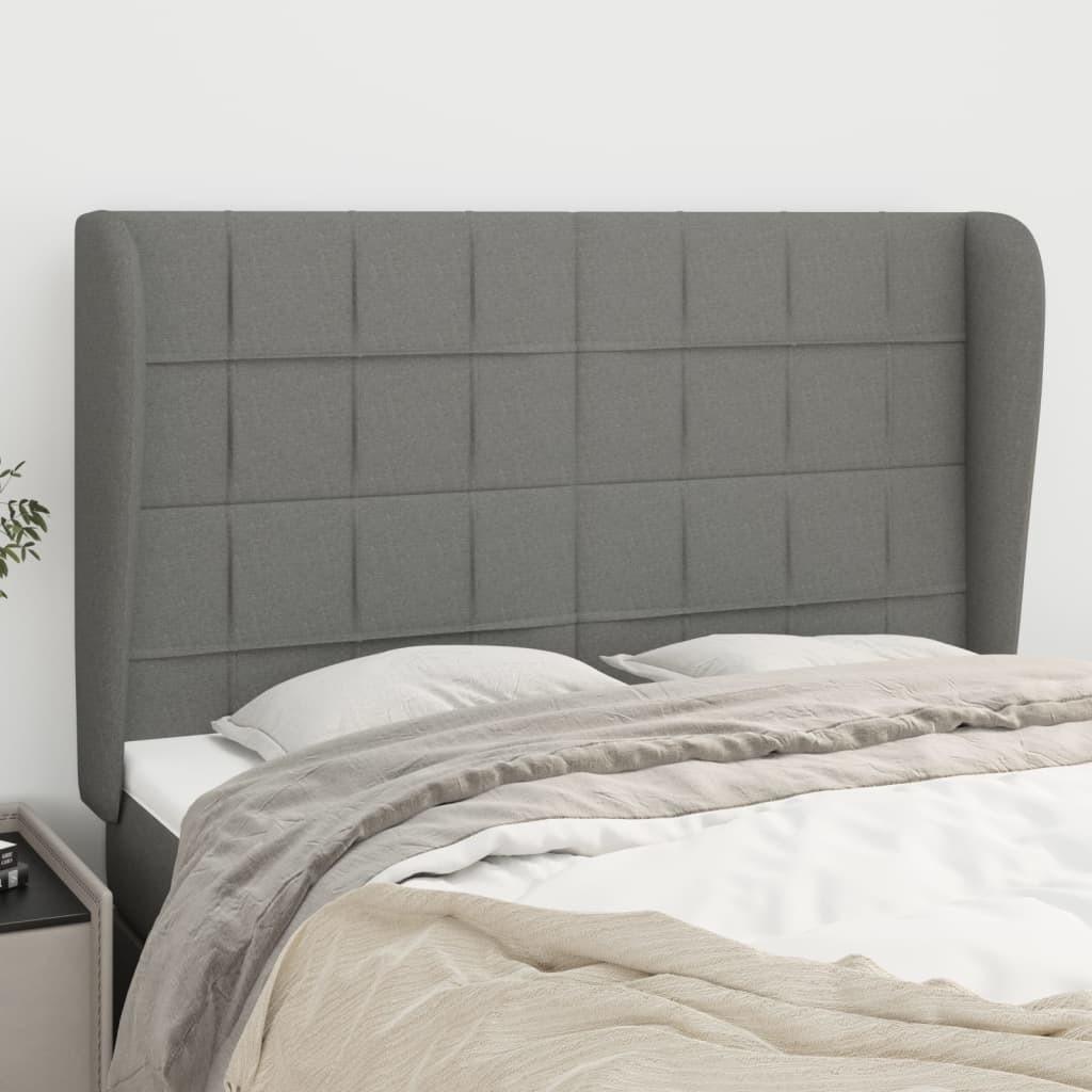 Sengegavl med kanter 147x23x118/128 cm stof mørkegrå billede