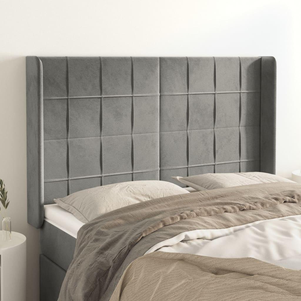 Sengegavl med kanter 147x16x118/128 cm fløjl lysegrå billede