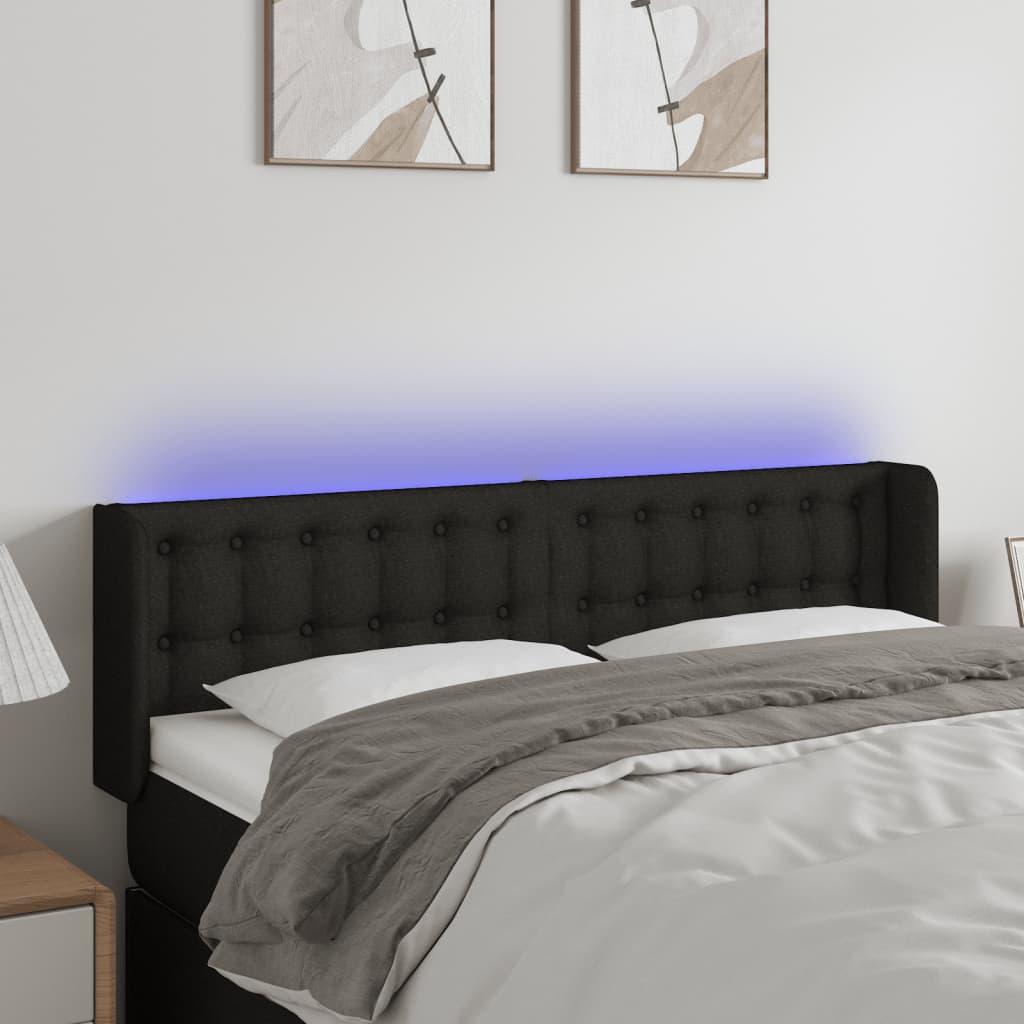 Sengegavl med LED-lys 147x16x78/88 cm stof sort billede