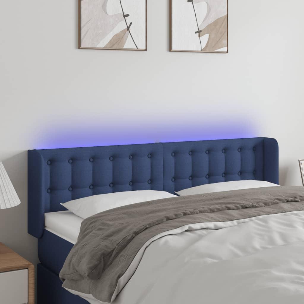 Sengegavl med LED-lys 147x16x78/88 cm stof blå billede