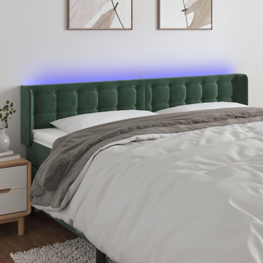 Sengegavl med LED-lys 163x16x78/88 cm fløjl mørkegrøn billede