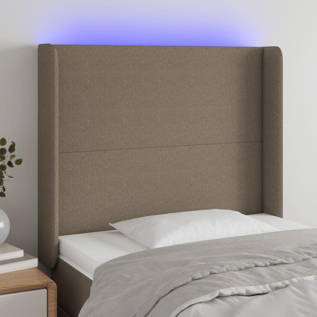Sengegavl med LED-lys 83x16x118/128 cm stof gråbrun billede