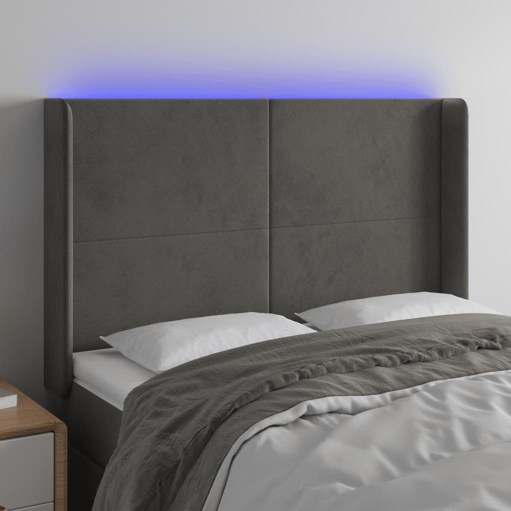 Sengegavl med LED-lys 147x16x118/128 cm fløjl mørkegrå billede