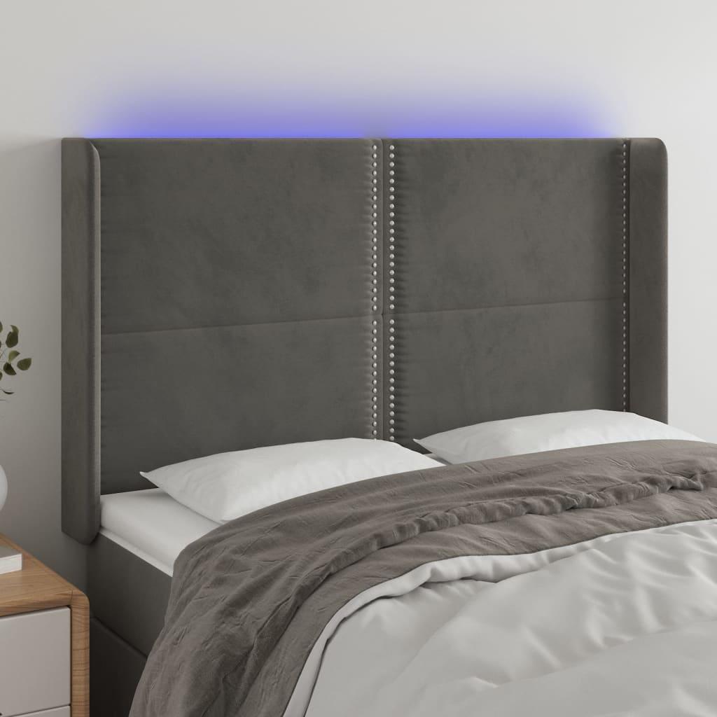 Sengegavl med LED-lys 147x16x118/128 cm fløjl mørkegrå billede