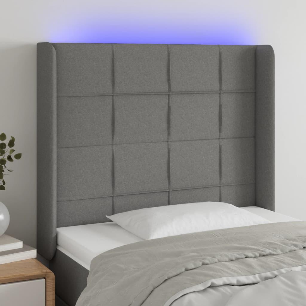 Sengegavl med LED-lys 103x16x118/128 cm stof mørkegrå billede
