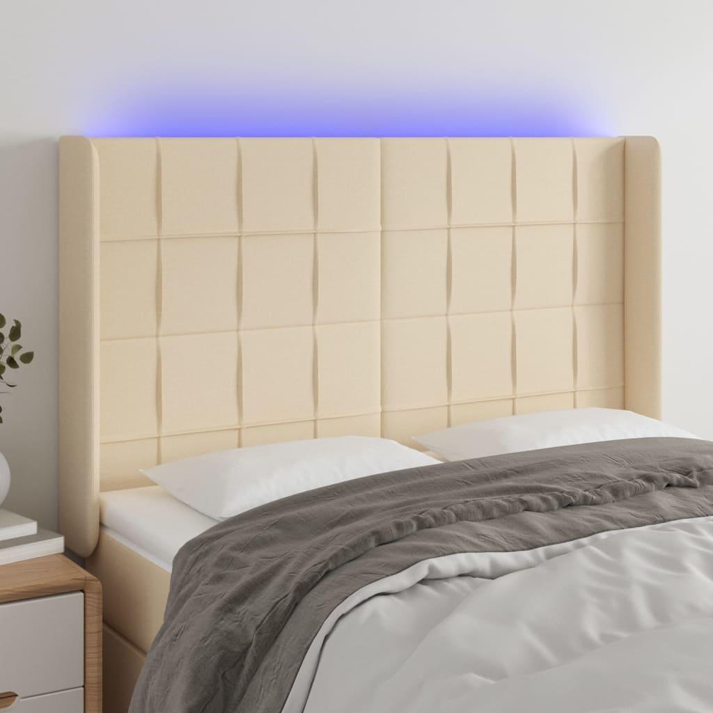 Sengegavl med LED-lys 147x16x118/128 cm - stof, cremefarvet billede