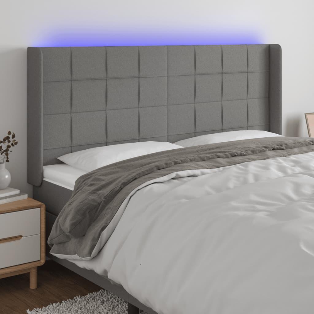 Sengegavl med LED-lys 163x16x118/128 cm - stof, mørkegrå billede