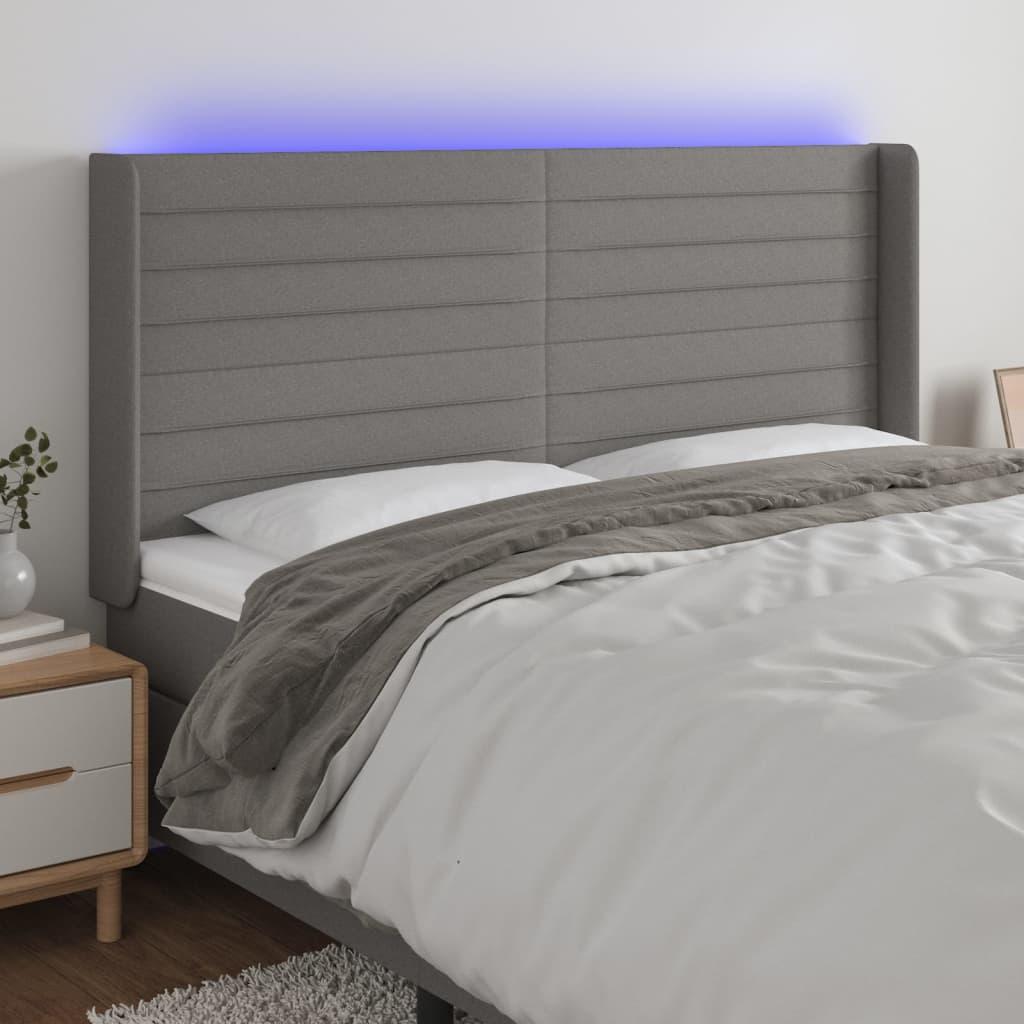 Sengegavl med LED-lys 203x16x118/128 cm stof mørkegrå billede