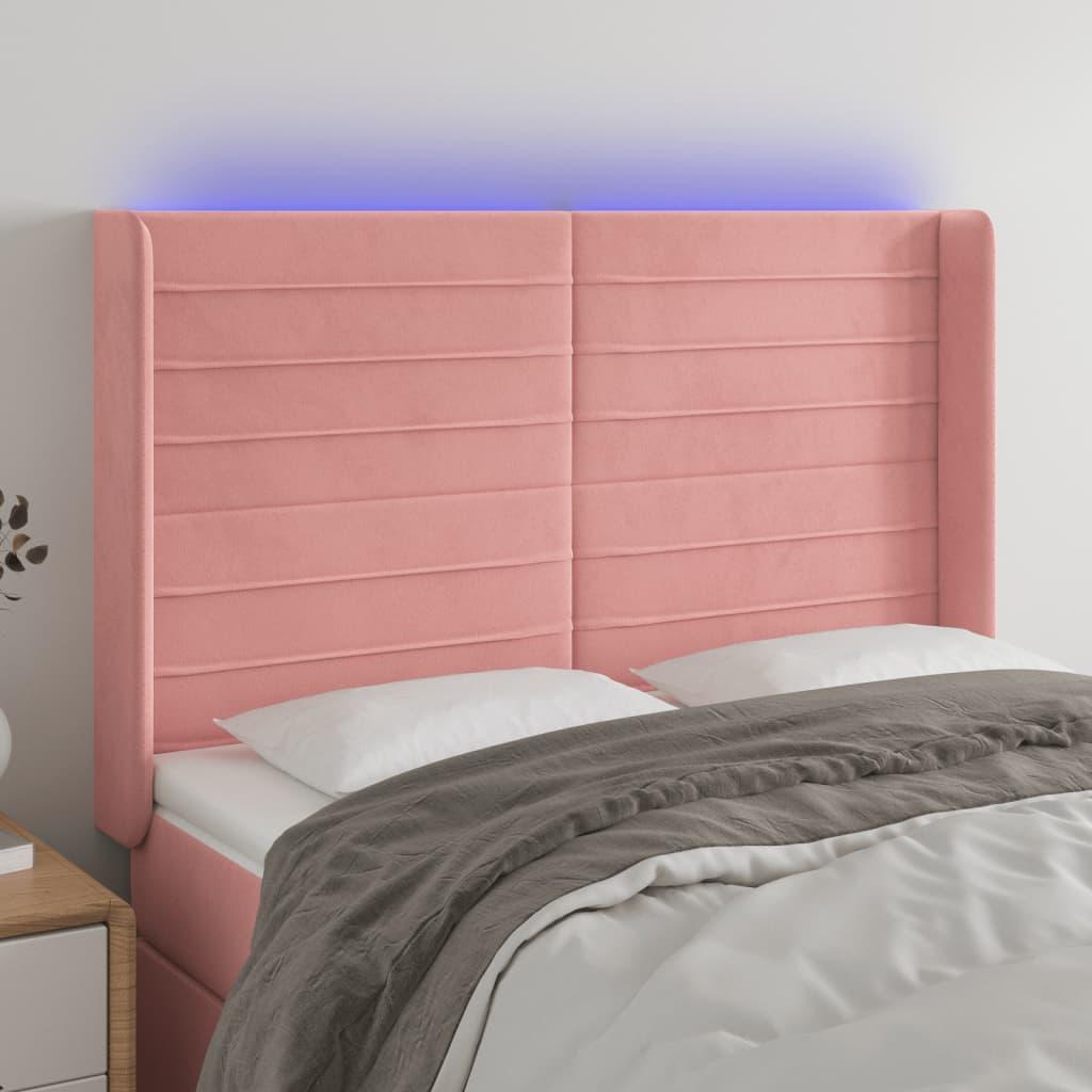 Sengegavl med LED-lys 147x16x118/128 cm fløjl lyserød billede