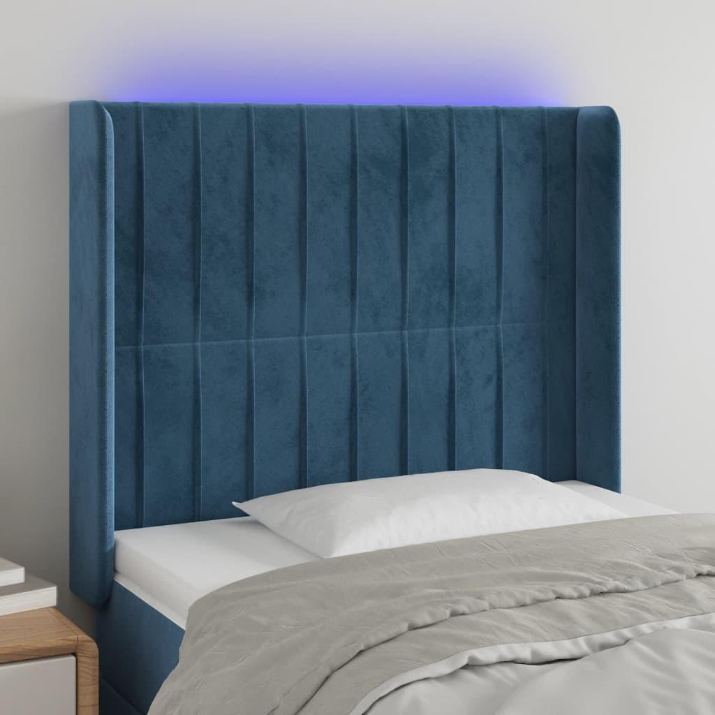 Sengegavl med LED-lys 83x16x118/128 cm fløjl mørkeblå billede