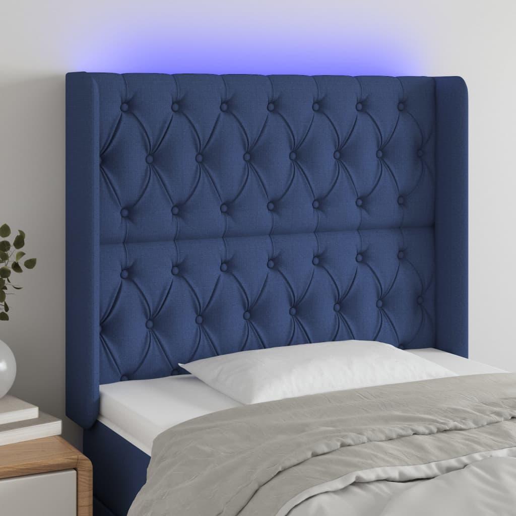 Sengegavl med LED-lys 103x16x118/128 cm stof blå