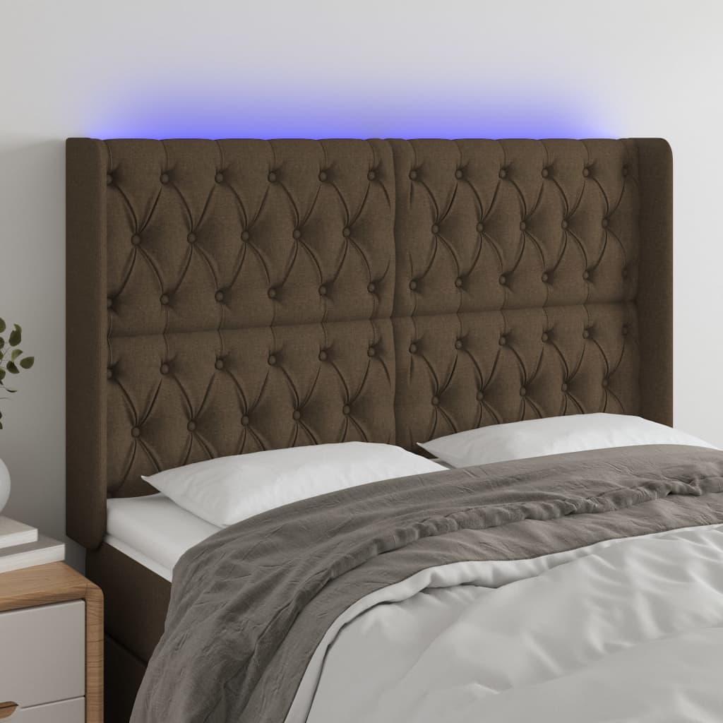 Sengegavl med LED-lys 163x16x118/128 cm - stof, mørkebrun billede