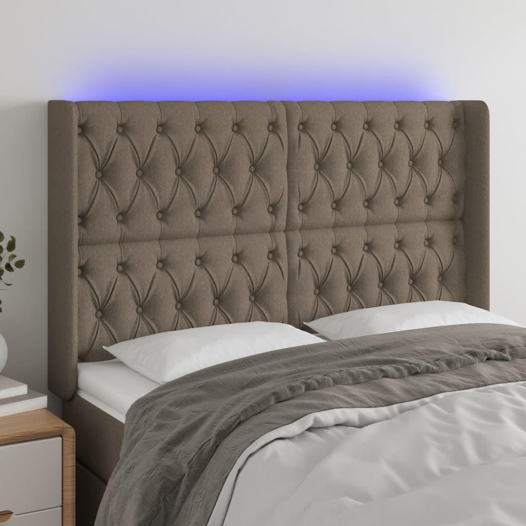 Sengegavl med LED-lys 163x16x118/128 cm stof gråbrun billede