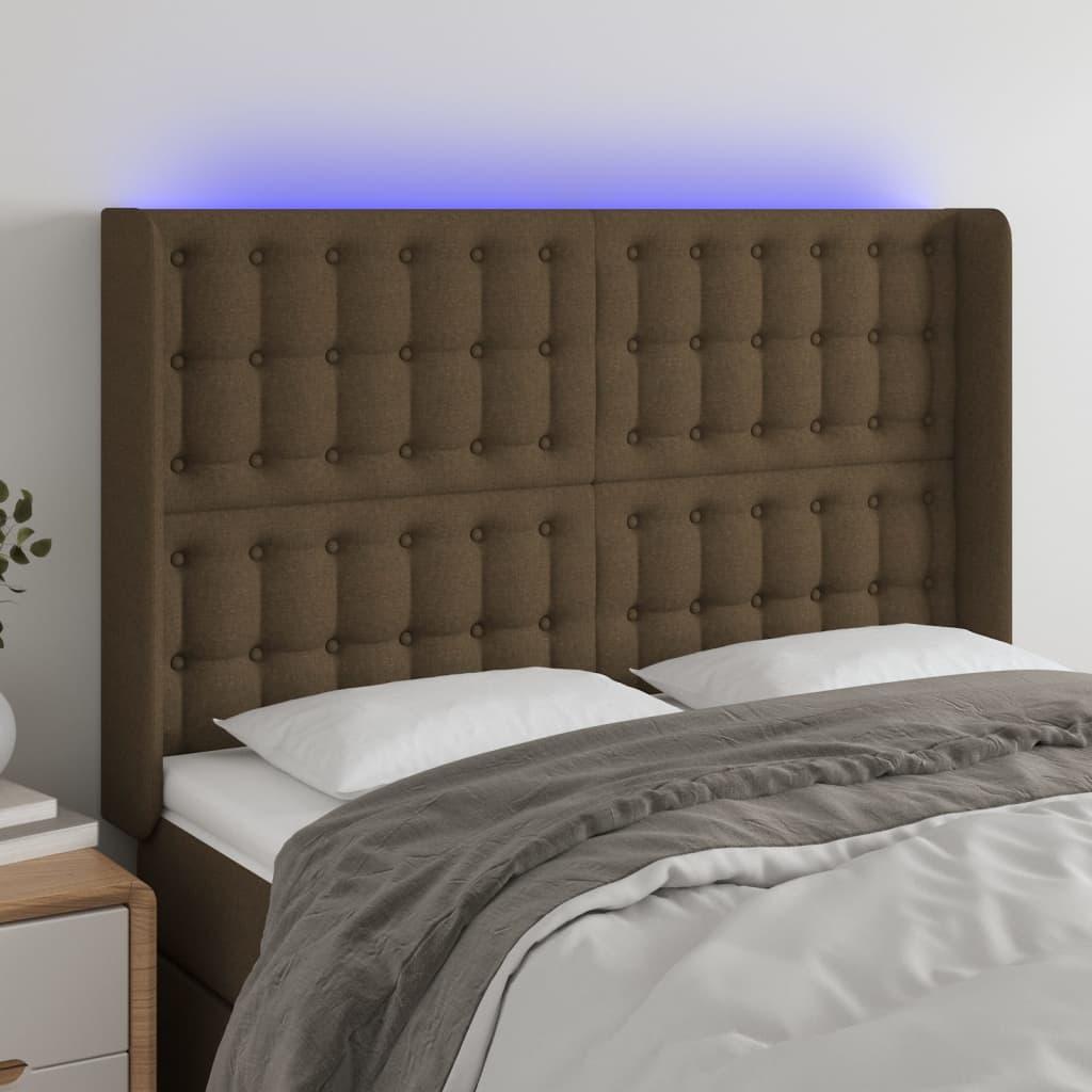 Sengegavl i stof med LED-lys 147x16x118/128 cm - mørkebrun billede