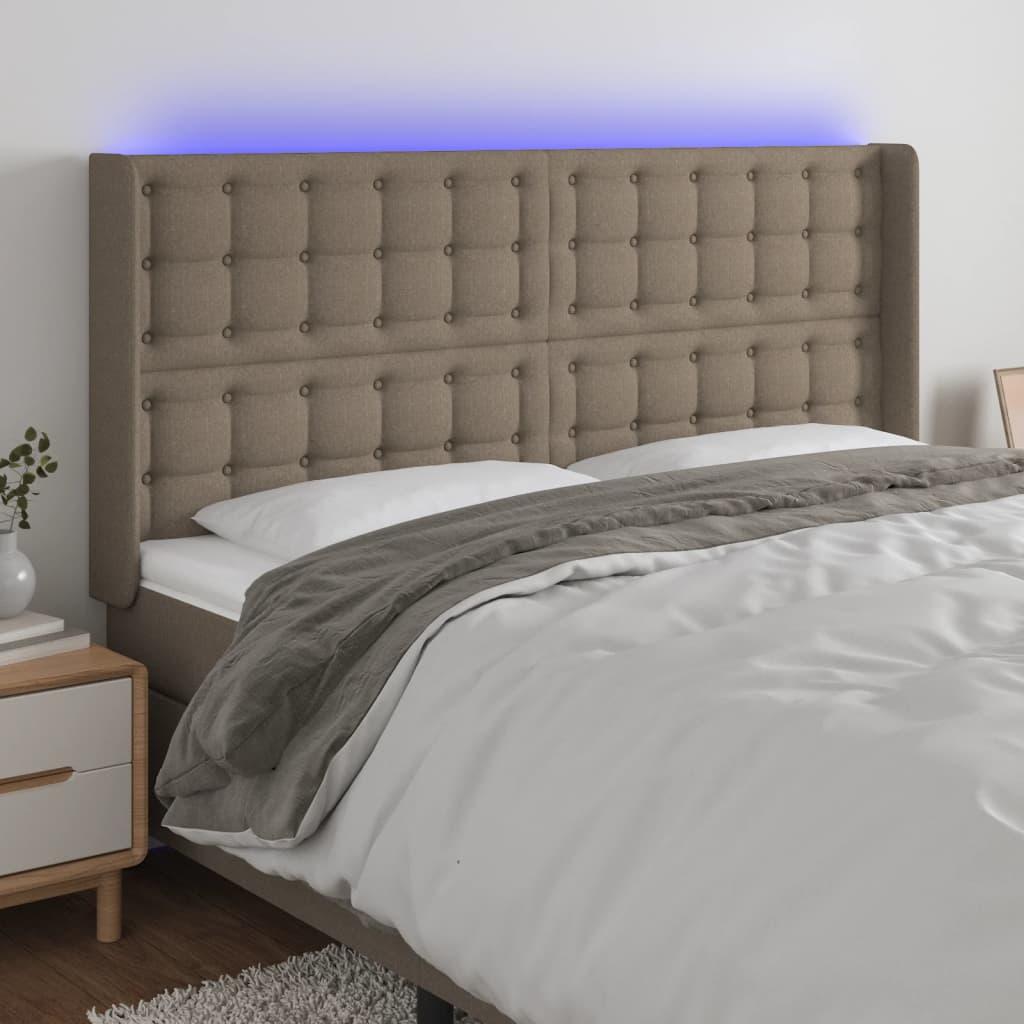 Sengegavl med LED-lys 163x16x118/128 cm stof gråbrun billede