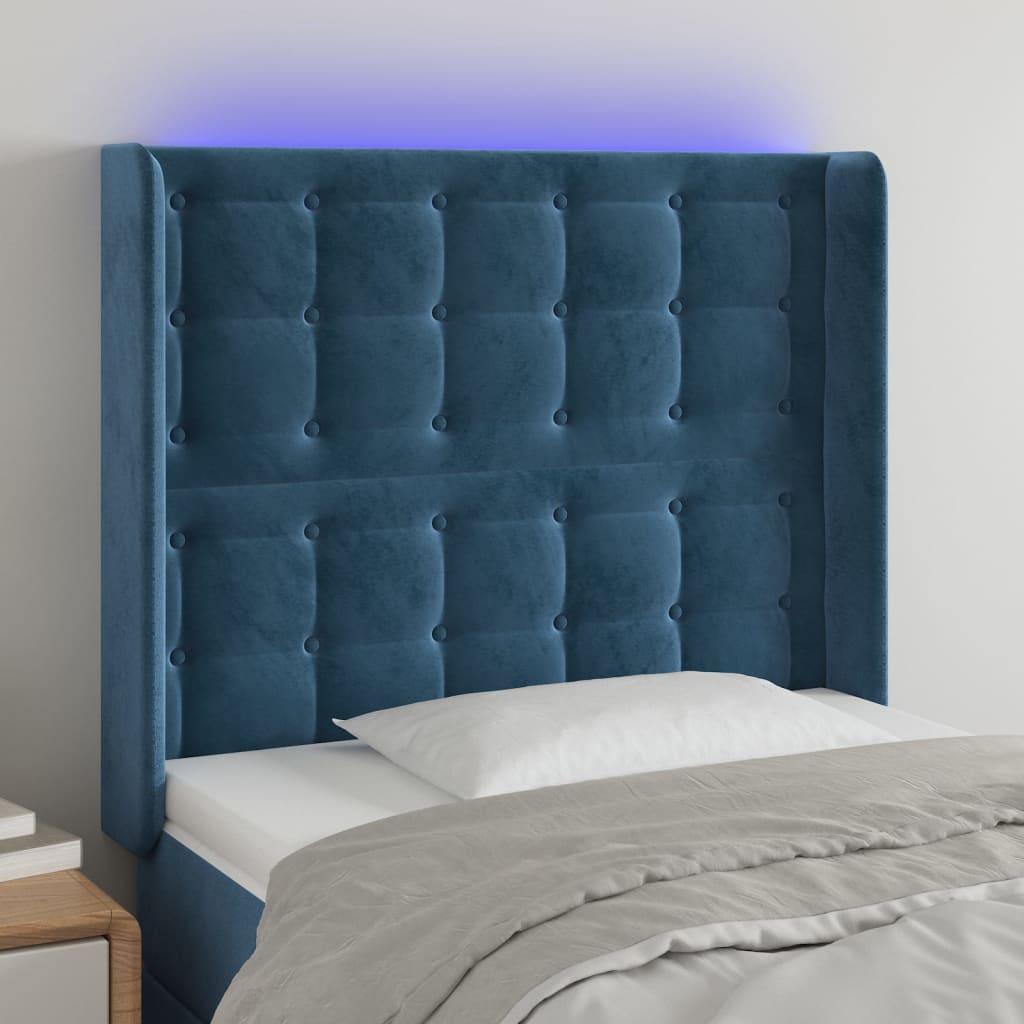 Sengegavl med LED-lys 83x16x118/128 cm fløjl mørkeblå billede