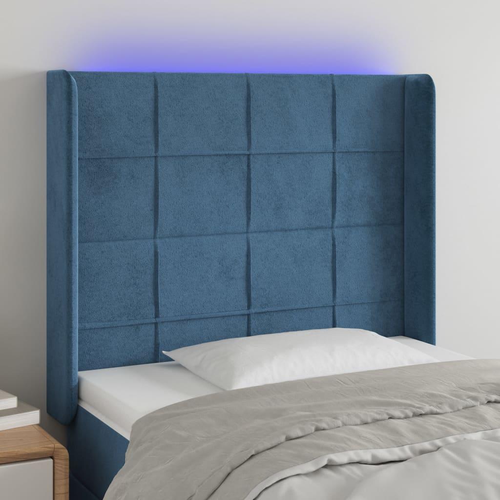 Sengegavl med LED-lys 103x16x118/128 cm fløjl mørkeblå billede