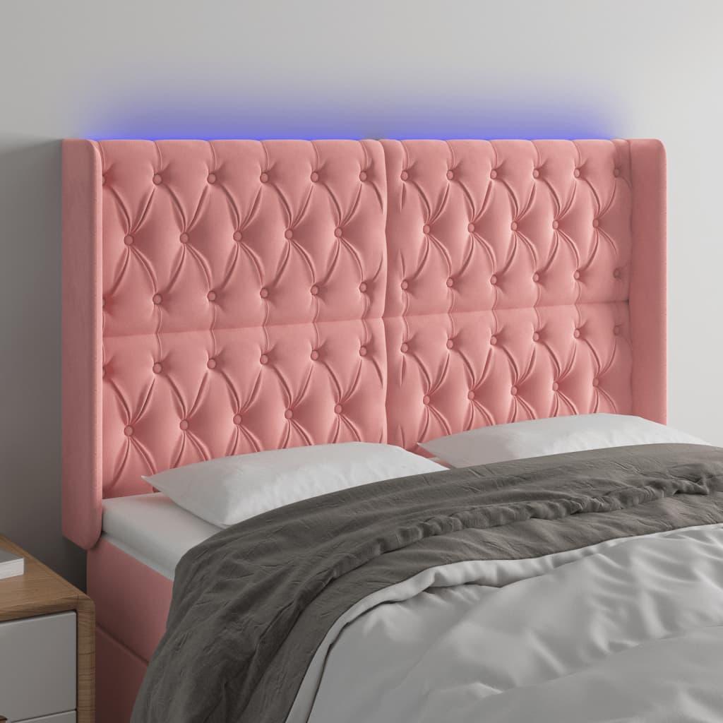 Sengegavl med LED-lys 147x16x118/128 cm fløjl lyserød billede