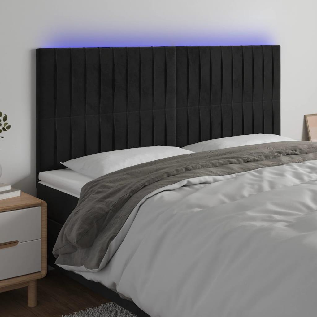 Sengegavl med LED-lys 200x5x118/128 cm fløjl sort billede