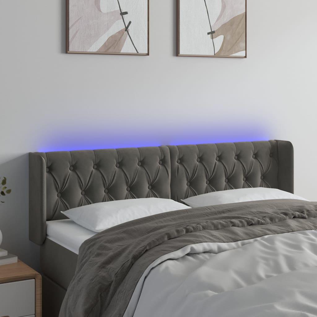 Sengegavl med LED-lys 147x16x78/88 cm fløjl mørkegrå billede