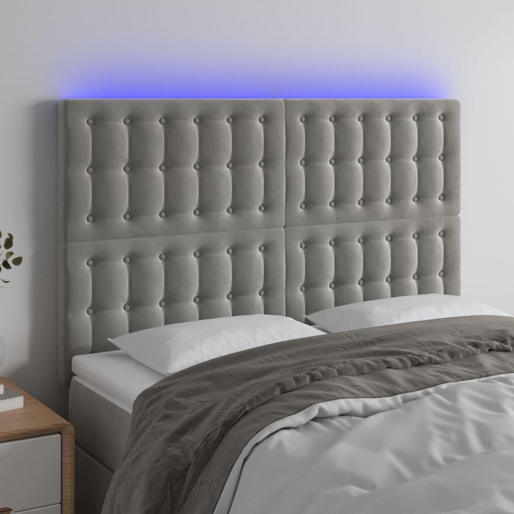 Sengegavl med LED-lys 144x5x118/128 cm fløjl lysegrå billede