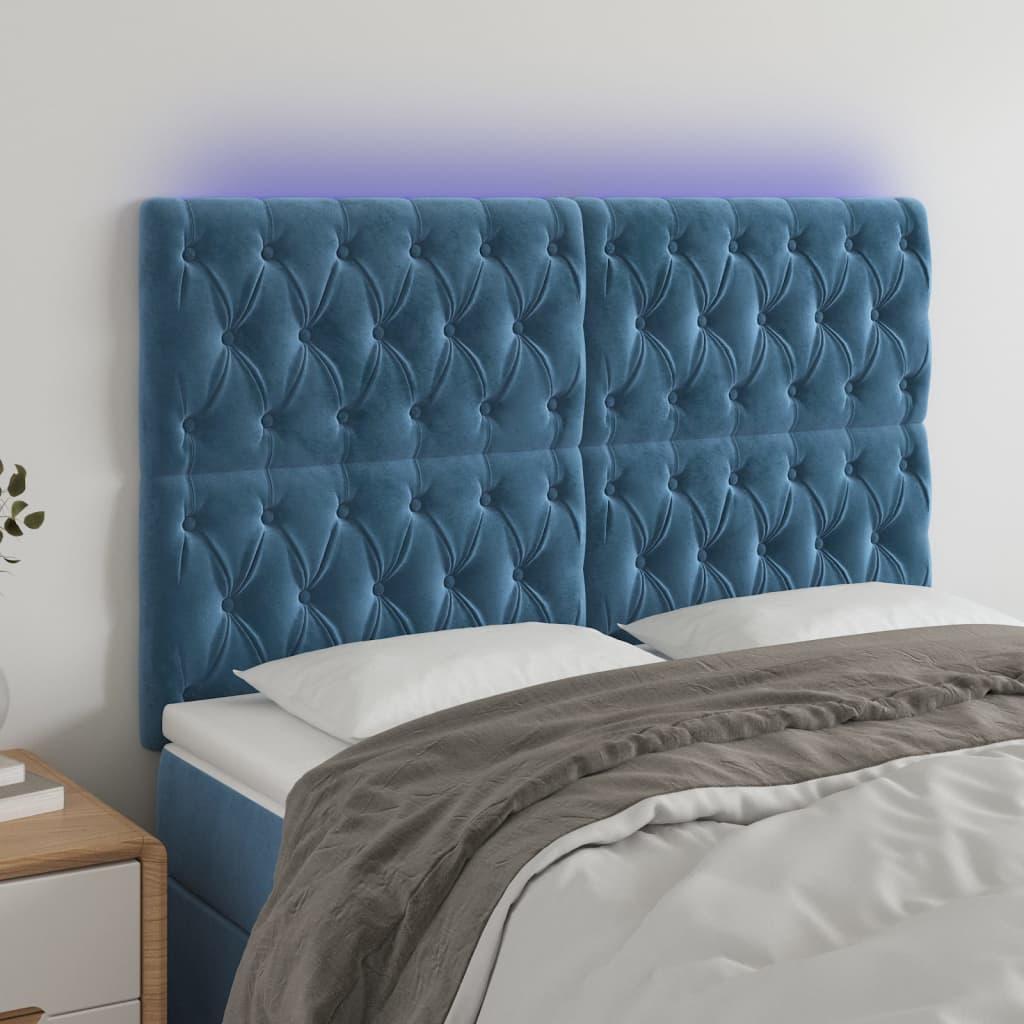 Sengegavl med LED-lys 144x7x118/128 cm fløjl mørkeblå billede