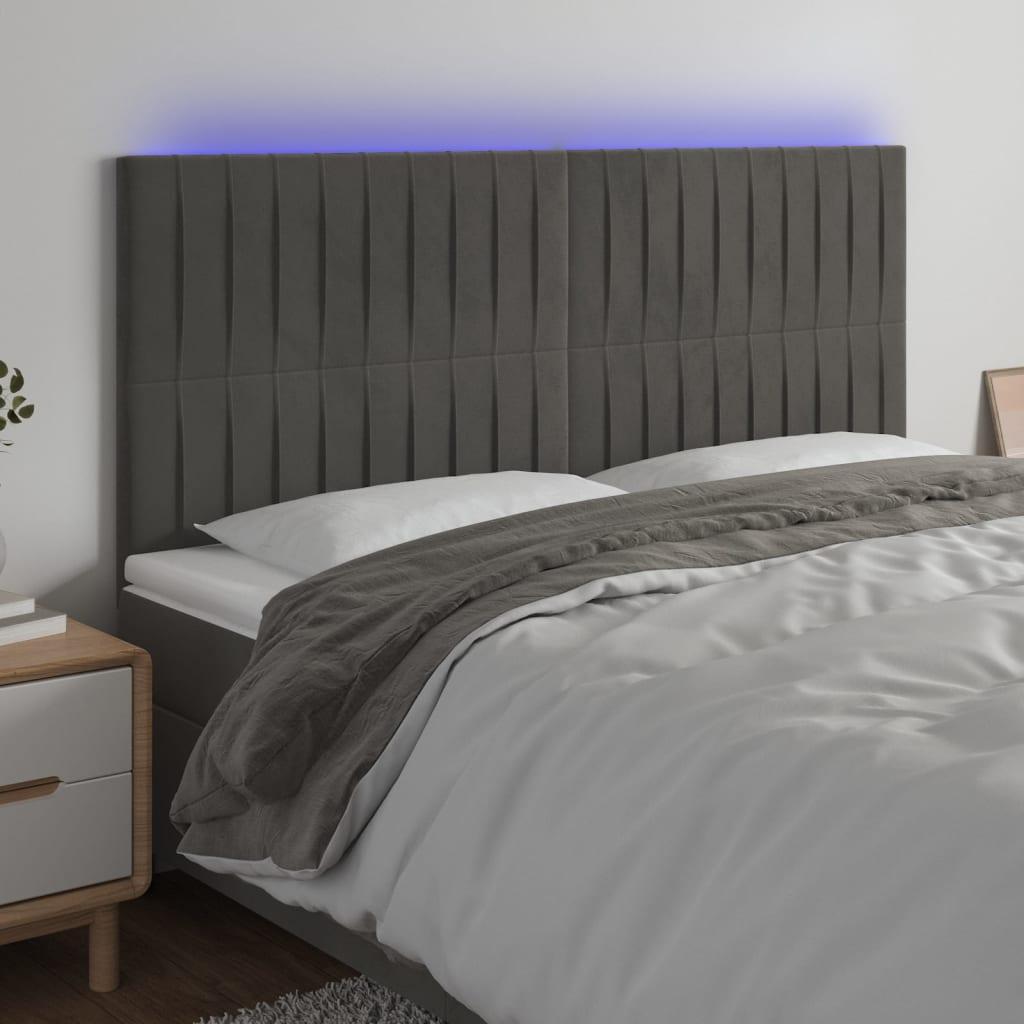 Sengegavl med LED-lys 200x5x118/128 cm fløjl mørkegrå billede