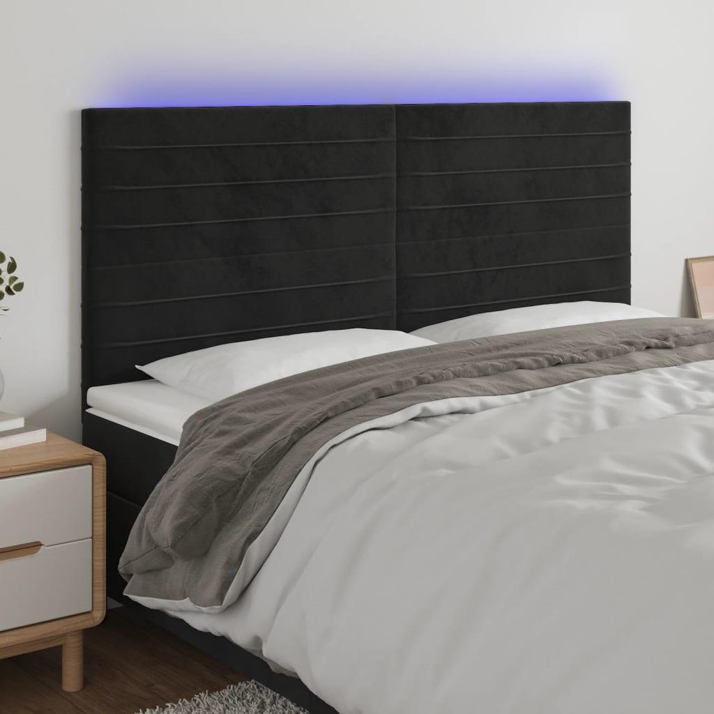 Sengegavl med LED-lys 180x5x118/128 cm fløjl sort billede