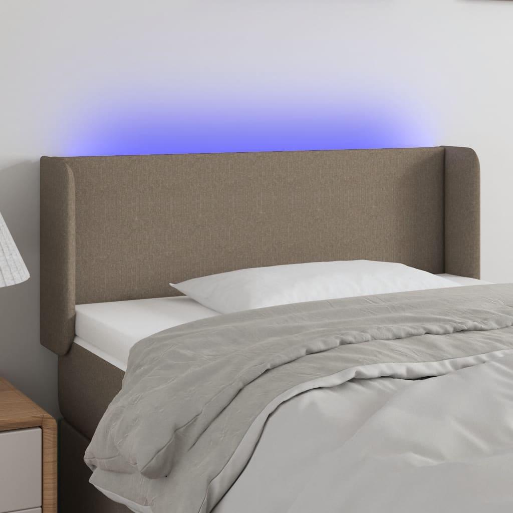 Sengegavl med LED-lys 83x16x78/88 cm stof gråbrun billede