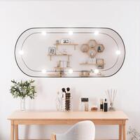 Vægspejl med LED-lys 45x100 cm oval glas