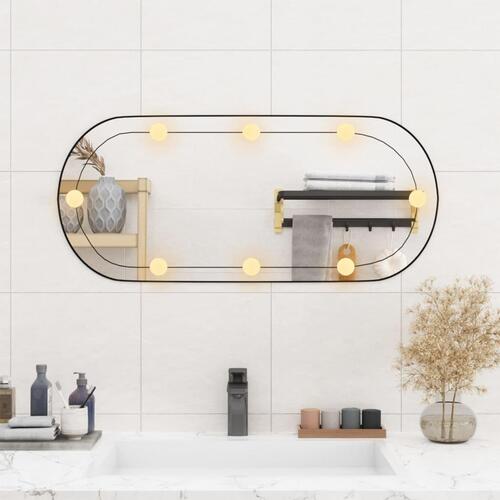 Vægspejl med LED-lys 35x80 cm oval glas