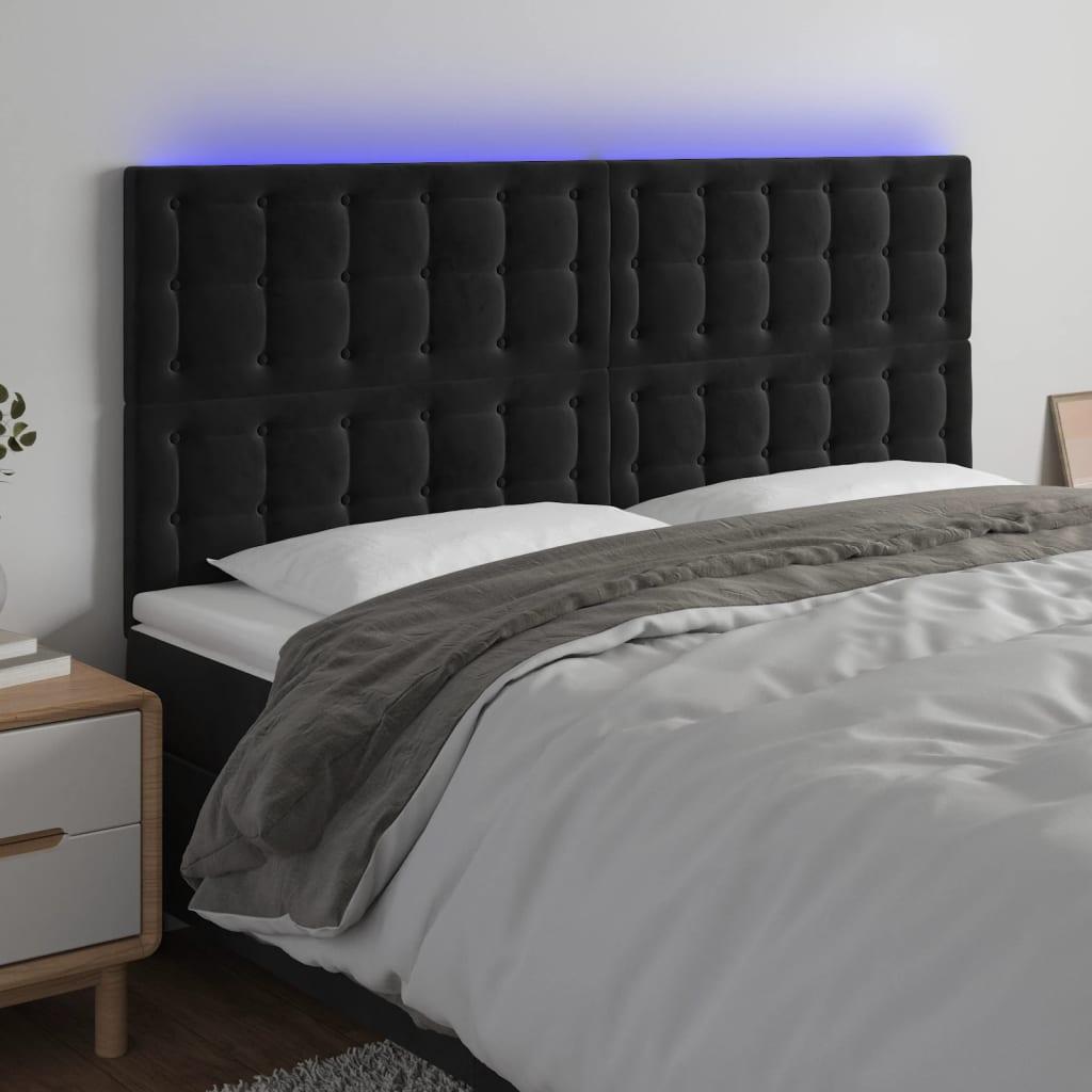 Sengegavl med LED-lys 180x5x118/128 cm fløjl sort billede