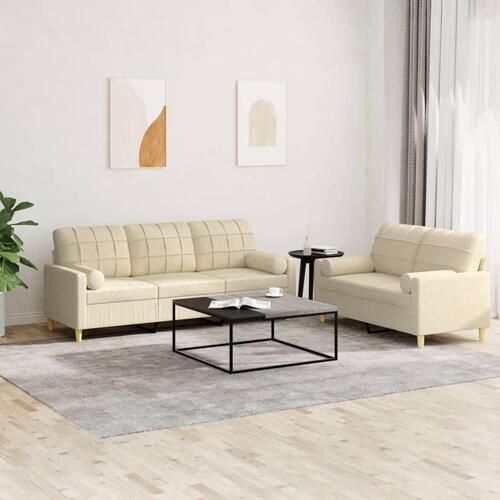 2 personers sofa med puder stof cremefarvet