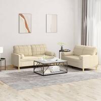 2 personers sofa med puder stof cremefarvet