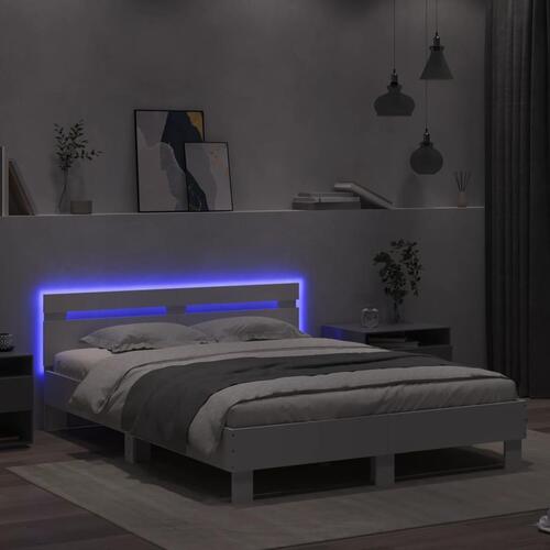 Sengeramme med sengegavl og LED-lys 140x190 cm sonoma-eg