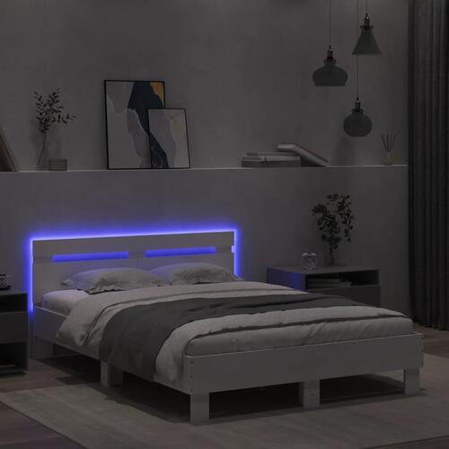 Sengeramme med sengegavl og LED-lys 135x190 cm hvid