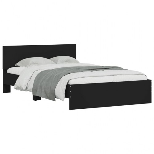 Sengeramme med sengegavl og LED-lys 135x190 cm sort